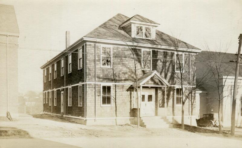 Megunticook Grange. The brick schoolhouse is to its left. To the right, High Mountain Hall. (Image courtesy Camden Historic Resources Committee)