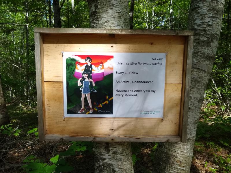 And example of a display along the Pride Walk at Ericson Fields Preserve in Rockport shows art by Max Beninati and words by Mira Hartman. (Photo courtesy OUT Maine)