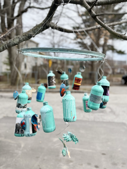 Intercultural Community Center, Westbrook (wind chime made from a bike wheel, glass bottles, and found natural items). (Photo courtesy ecomaine)