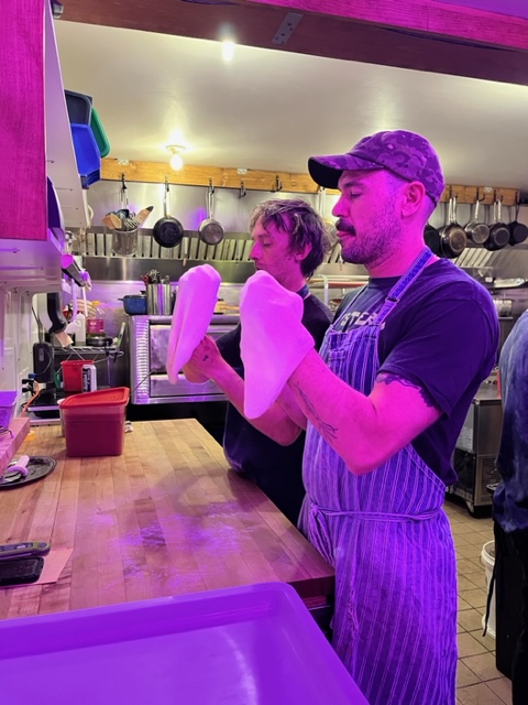 Sous chef Matthew Porter, and chef/owner Derek Richard stretching dough. Photo courtesy Gabriela Acero