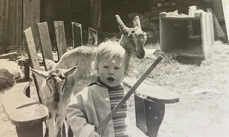 Little Bill O’Brien shares a seat with a goat. (Photo by Diane O’Brien) Goats