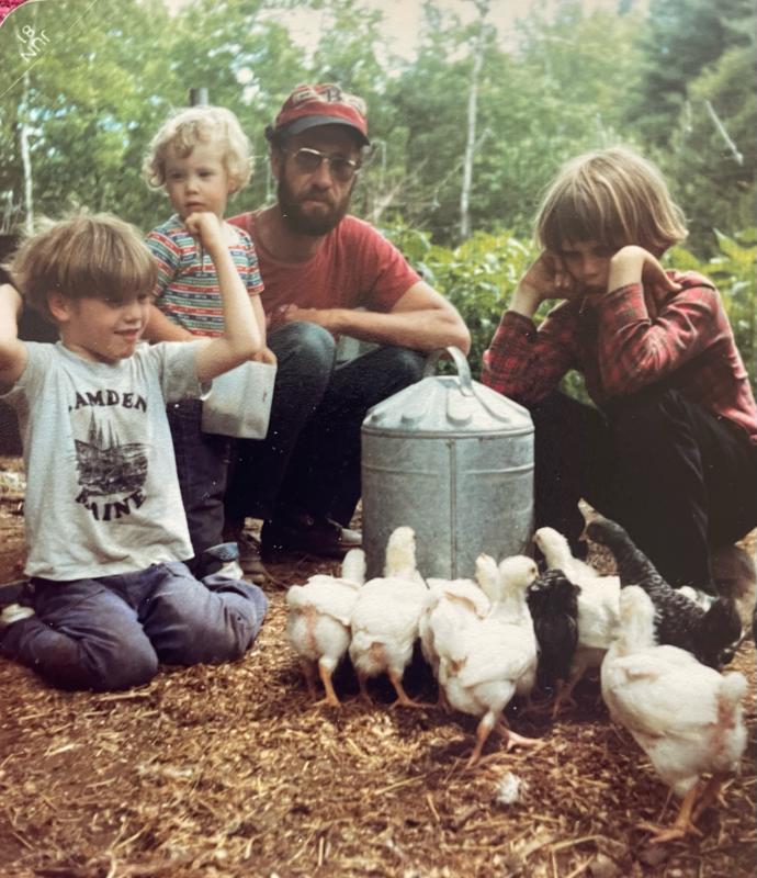 The O’Brien boys welcome a new group of chickens to the barnyard. (Photo by Diane O’Brien) Chickens