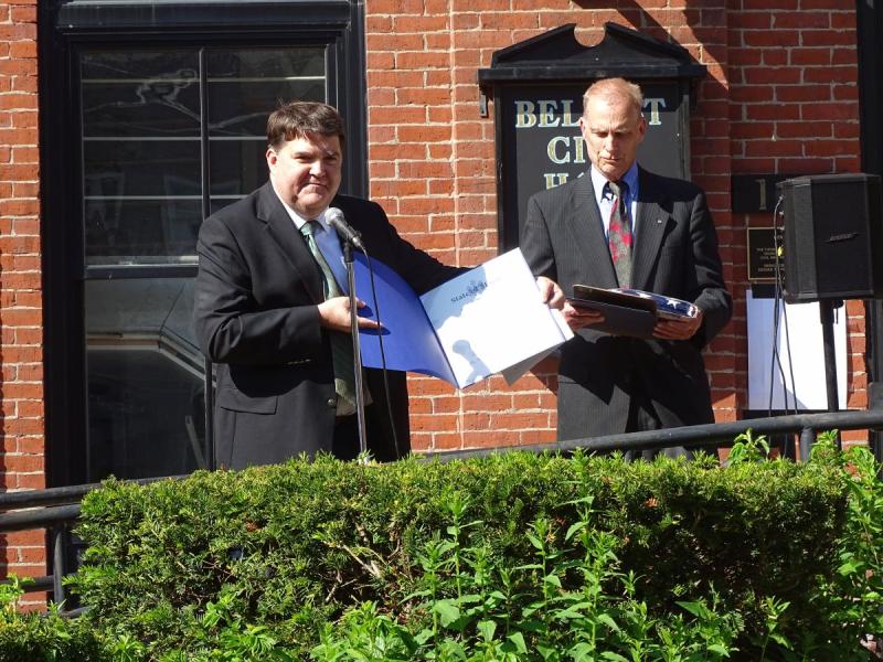Senator Chip Curry, who attended the event, offered his congratulations and praise to the City. Curry is also a resident of Belfast. Here he presents Mayor Sanders with “a U.S. flag flown over the State capitol, in honor of Belfast’s 250th anniversary.” He also presented a sentiment from the Maine State Legislature honoring Belfast, crafted earlier that day. (photo by Erica Thoms)