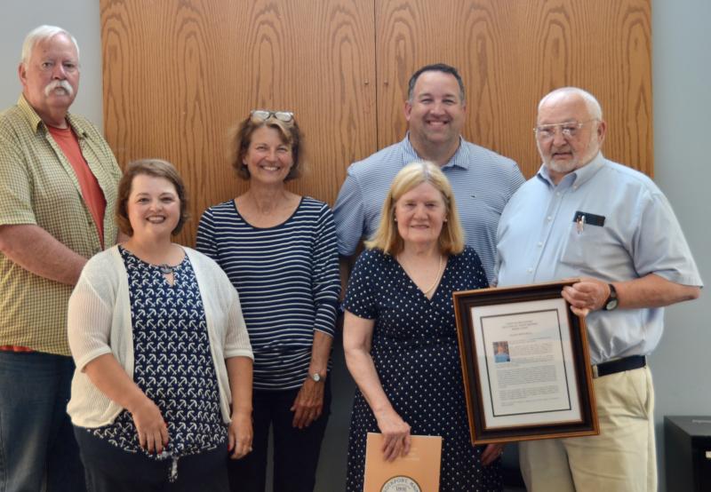 Select Board members Mark Kelley, Michelle Hannan, Denise Kennedy, Town Manager Jon Duke, with Marge and Allen Mitchell. (Photo by Lynda Clancy)