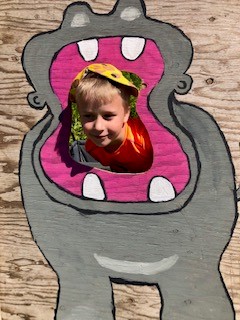 Kayden Barnard feeds the hungry, hungry hippo. (Photo courtesy Thomaston Grammar School)