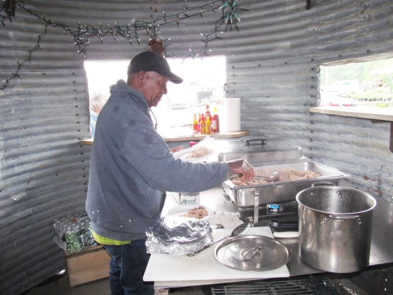 Dennis McCalla has been working for Beth’s Farm Market since 2000, and has a kitchen dedicated for his signature dish. (Photo by Kay Stephens)