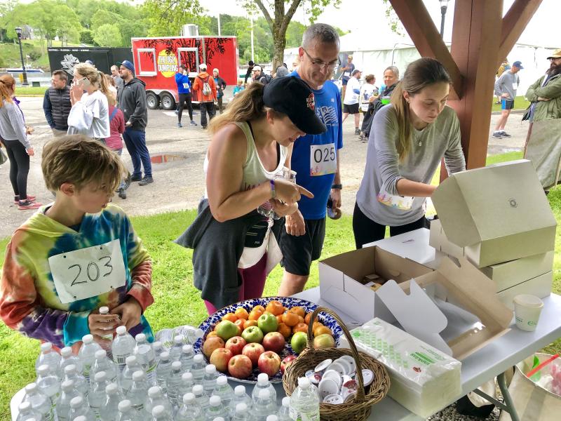Runners and walkers enjoyed sweet rewards (free donuts and fruit) at the finish line. (Photo courtesy Rockport Public Library)