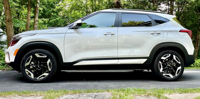 Looks can be deceiving—the Seltos is in fact a relatively inexpensive subcompact SUV. Nonetheless, it is refined, satisfying to drive and highly competent. This color is Snow White Pearl.