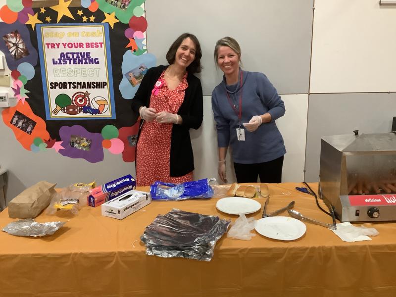 Rebecca Albright (Kindergarten teacher) and Heather Anderson (Speech Language Pathologist) served hot dogs provided by Friends of South School. (Photo courtesy Brenda Thomas)