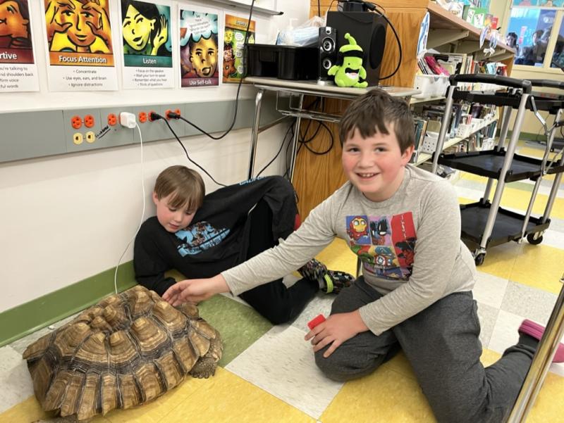 Mr. Drew brought a variety of animals including two snakes, some lizards, a scorpion, Madagascar hissing cockroaches, a tarantula, a turtle, and a 50-pound tortoise named Tank. (Photo courtesy Brenda Thomas)