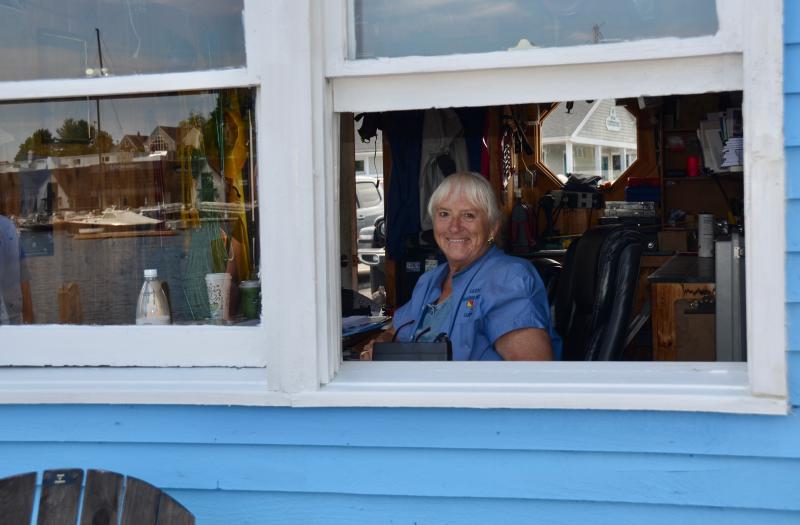 Janet Halsey keeps an eye on Camden Harbor July 4, 2023. (Photo by Lynda Clancy)