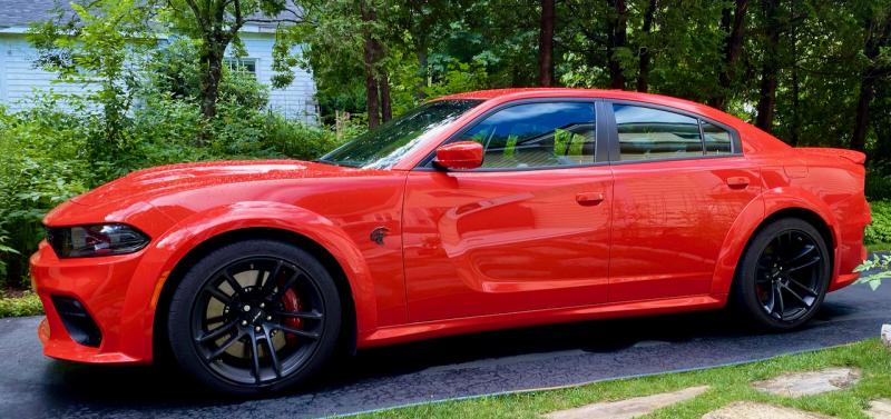 Especially in beefed-up Widebody trim, the Hellcat is a large car. What would it be like as a more-nimble two-seat coupe? Then we’d have another berserk Dodge, the Viper, discontinued in 2017 because it couldn’t fit side-curtain airbags. This color is Go Mango. It certainly is.