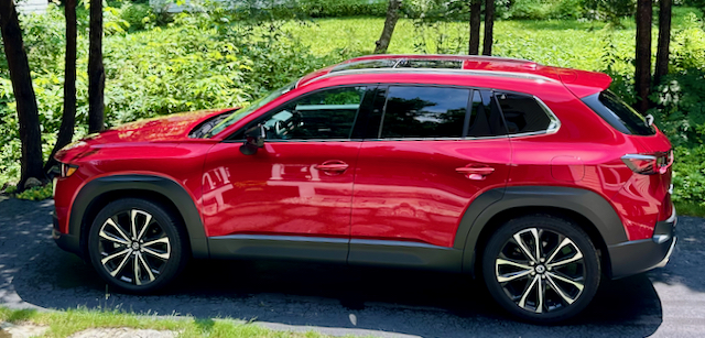 With the new-for-2023 CX-50, Mazda stakes out a spot at the upper end of the two-row SUV market. This color is Red Crystal Metallic.