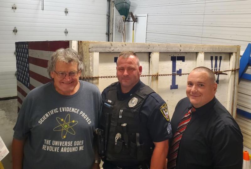 A member of the VFW stands with Sergeant Rick Smith and Detective Sergeant Daniel Fitzpatrick. (photo courtesy of Belfast Police)