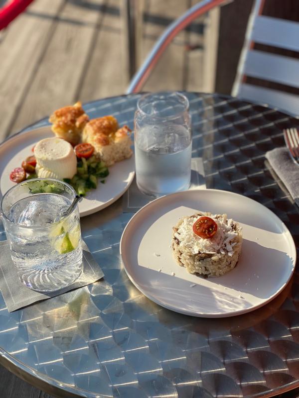 A cocktail and a bite from Paper Plane. Photo courtesy Clementina Senatore