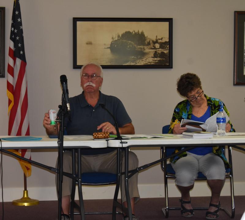 Owls Head Select Board members Gordan Page and Linda Post wait for the Aug. 21, 2023 Board meeting to begin. This was Page’s last meeting as a Board member. (Photo by Sarah Thompson)