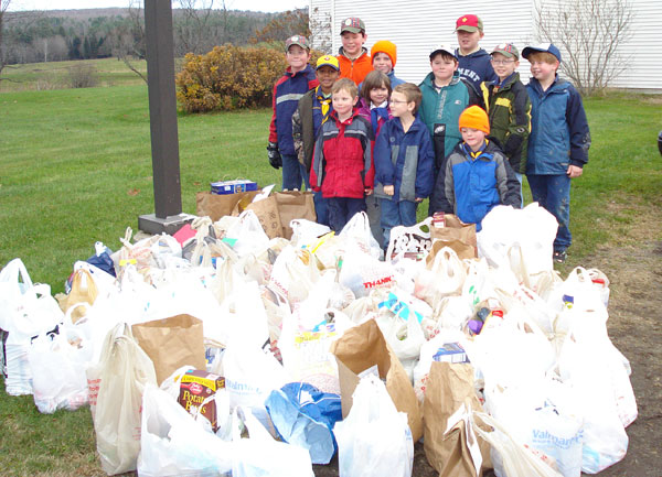 Farmington Area Scouts collected 142 bags of food for the needy in 2011. (Photo courtesy Chuck Mahaleris)