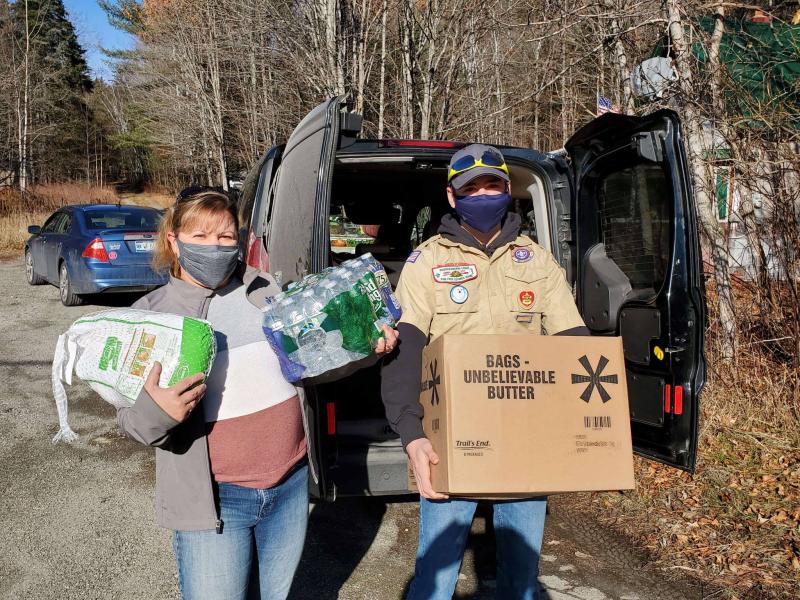 Heather and Tommy Sylvester, of the Forks, during the 2020 Scouting for Food Drive. Jackman area Scouts collected and distributed 26 boxes of food for the needy in the community that year. (Photo courtesy Chuck Mahaleris)