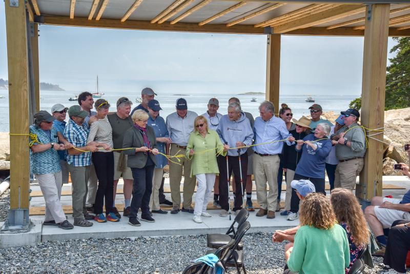 Maine Congresswoman Chellie Pingree and Gov. Janet Mills (center) cut the ribbon on the new Hurricane Island Field Research Station Aug. 5. (Photo courtesy Nate Hathaway)