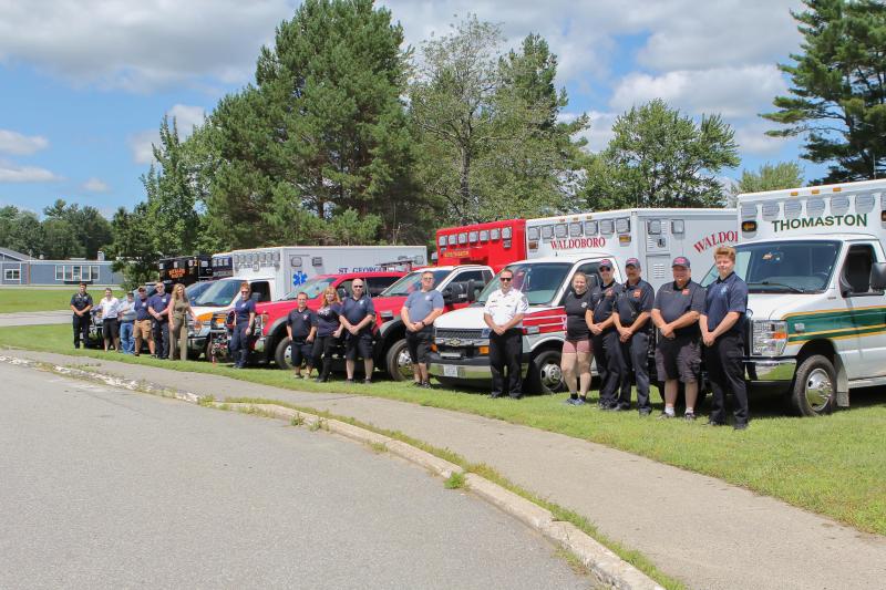 EMS and firefighters line up to honor the effort to raise awareness and funds for LifeFlight of Maine. (Photo courtesy Beck Butler Photography)