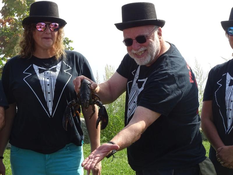 Barons Tina DelSanto and Bob Adler, who is holding the famous Passy Pete for the crowd to see. (photo by Erica Thoms)