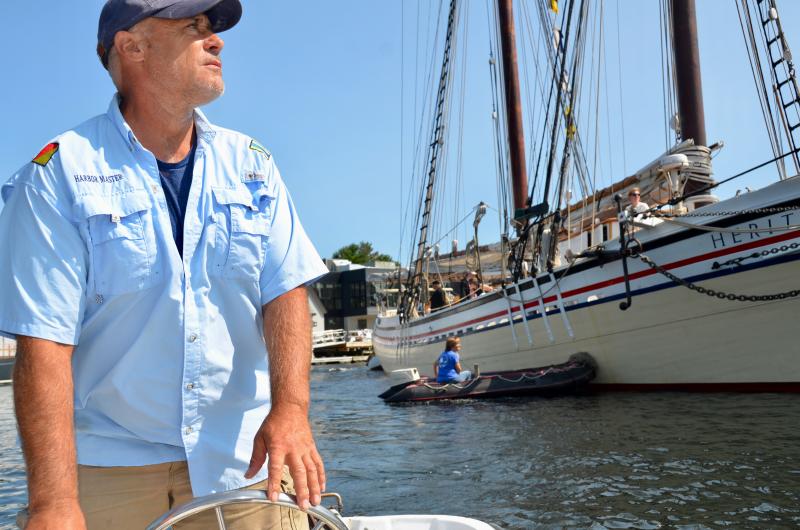 Camden Harbor Master Steve Pixley, moving the Schooner Heritage into her temporary berth in Camden’s inner harbor. (Photo by Lynda Clancy)
