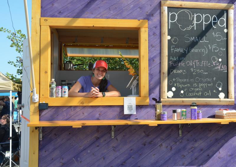 Courtney Sukeforth and her new popcorn business. (Photo by Lynda Clancy)