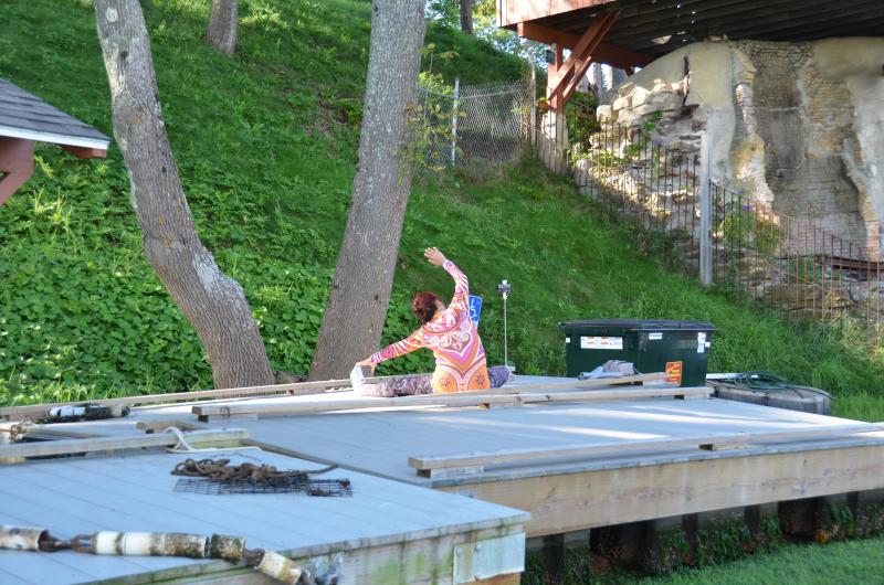 Some took advantage of the hauled floats on which to practice yoga.