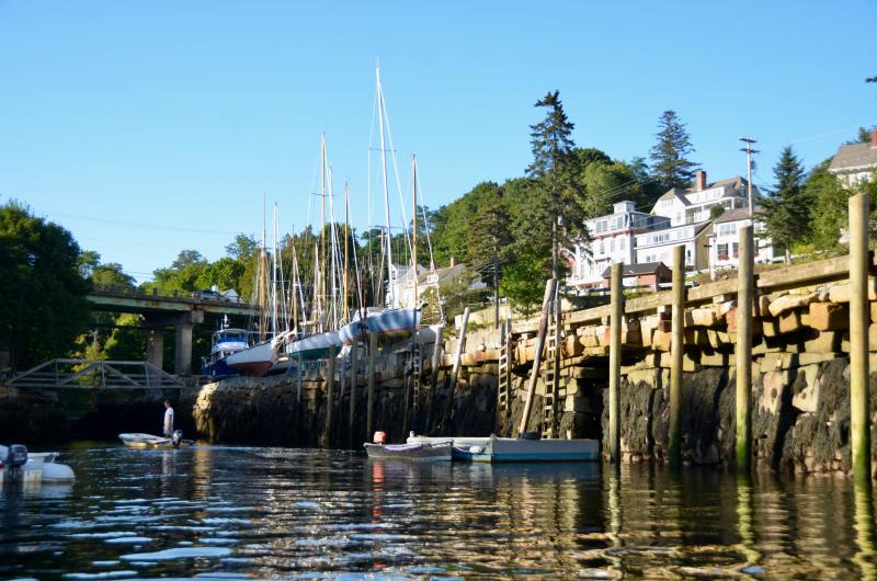 The Goose River Bridge over Rockport Harbor became a backdrop for a line of masts.