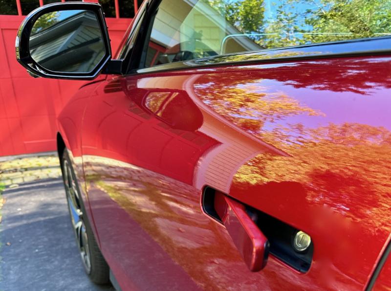 Many EVs have these door handles, which lie flush when the car is underway (for aerodynamic efficiency) and when the car is locked. A New England ice storm could jam them up if left open like this.