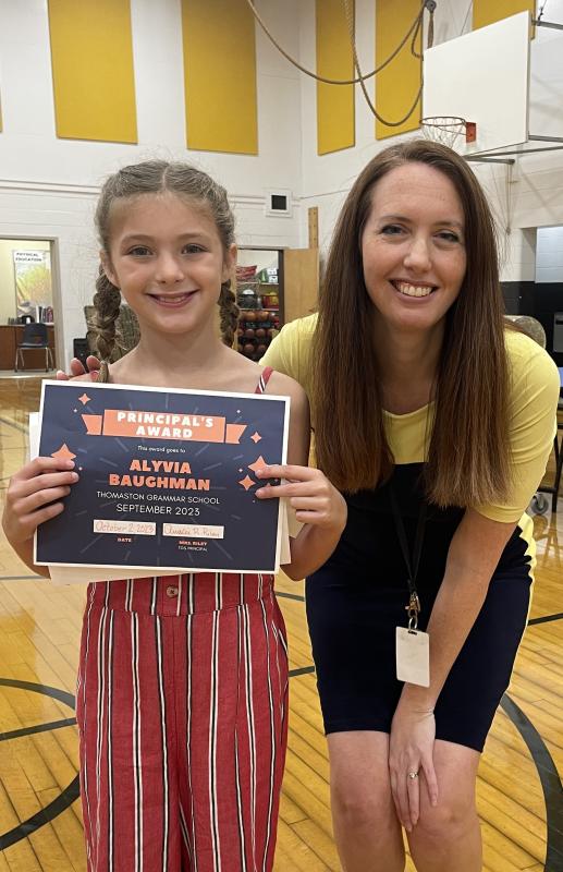 Alyvia Baughman receives the Principal’s Award from Principal Ainslee Riley. (Photo courtesy Thomaston Grammar School)
