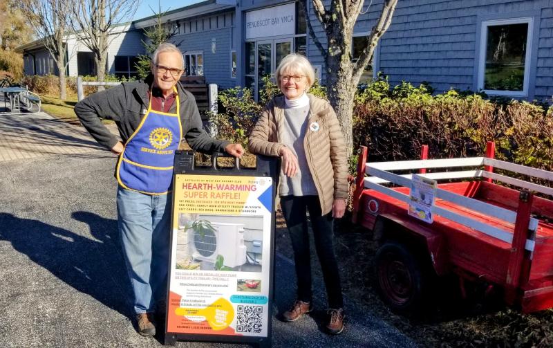 You could win and help keep everyone warm this winter as well! Shown here are Treasurer Peter Lindquist of West Bay Rotary’s Satellite Club and Deb Hitchings of The Shields Fund at First Congregation Church in Camden.