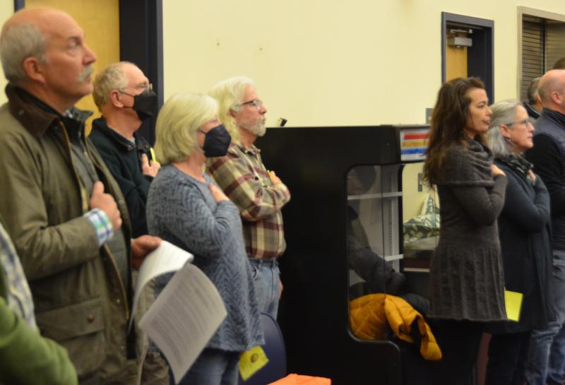 The first order of business at the Dec. 11 special town meeting was the pledge of allegiance. (Photo by Lynda Clancy)