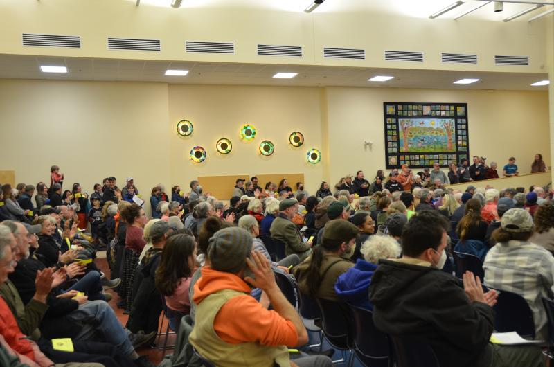 Applause filled the cafeteria following the affirmative vote. (Photo by Lynda Clancy)