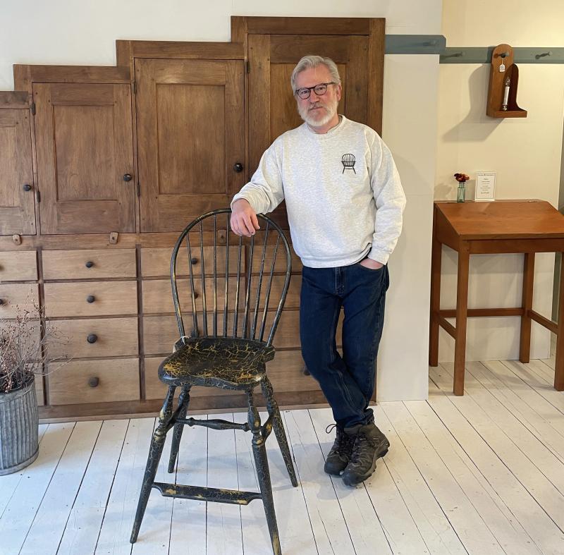 Michael Timchak with some of his work at Windsor Chairmakers. (Photo by Ed O’Brien)