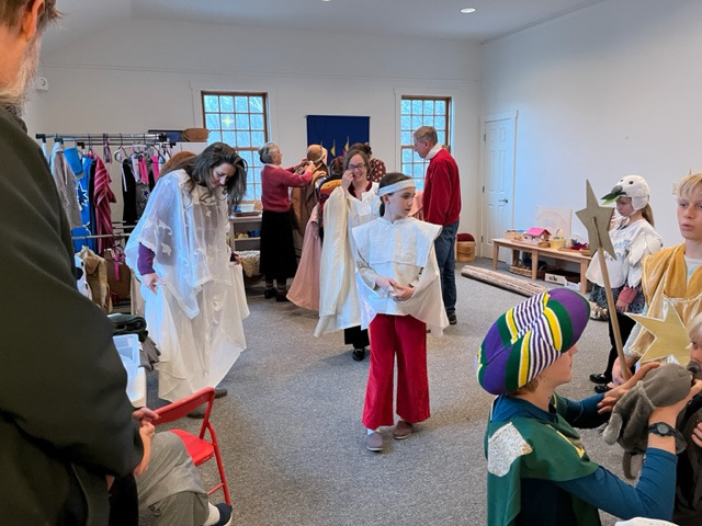 Trying on costumes for the UCC Nativity Play which will be performed at the Christmas Eve Service (Photo by Diane O’Brien)