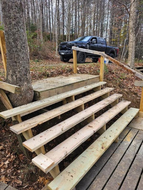 and built new and wider staircases to make it easier for those carrying toboggans up to the top of the chute. t