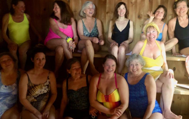 Wander Woman Tours alumni and friends in Erja Lipponen’s Finish Sauna. Wine and hot soup was served afterwards in a lakeside cottage. (Photo by Erja Lipponen)