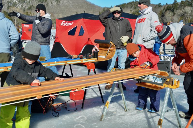 It is a full-on push to prep the toboggans so they reach their maximum speeds and performance.