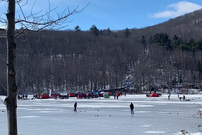 Looking across the ice toward the chute from Hosmer Pond Road.
