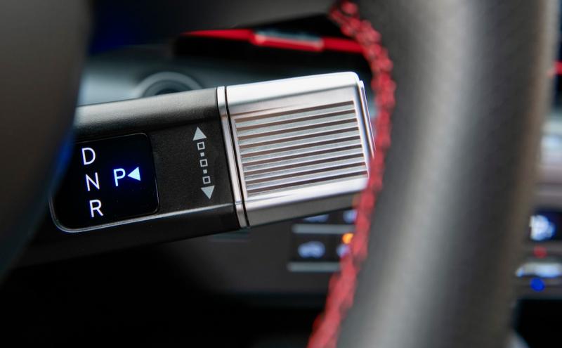 The Kona’s gear selector is this stalk that protrudes out from behind the steering column on the right side. Don’t try to flick it up or down; instead, rotate the silvery end away from you to engage D and toward you for R. Push in on the end of the stalk to engage Park. It’s more intuitive than it sounds.