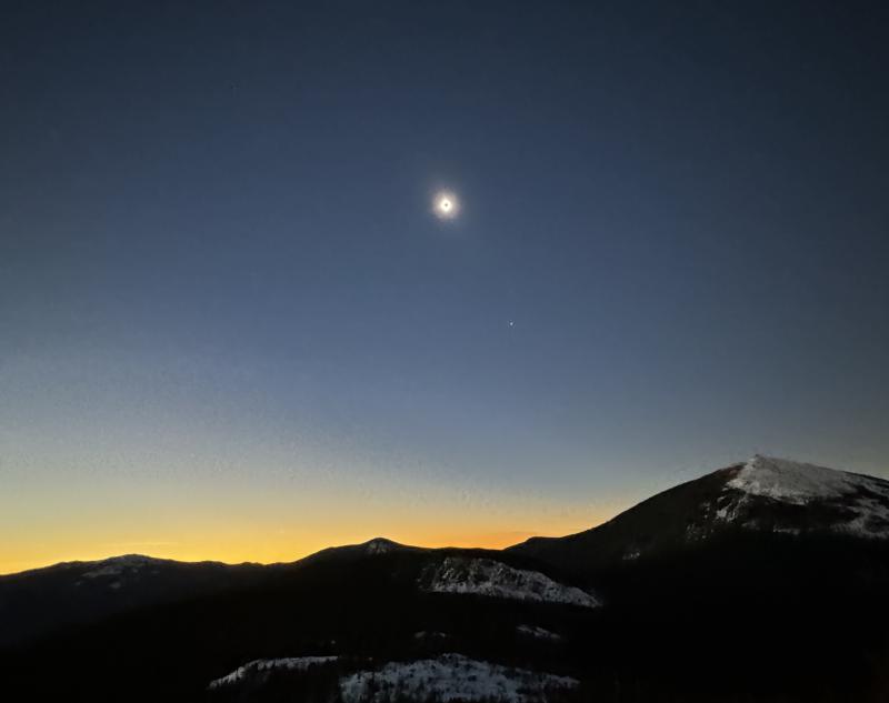 The solar eclipse looking toward Sugarloaf Mountain from Burnt Mountain. “Truly wondrous. No I get why people chase total eclipses,” said Photographer Lori Van Dusen