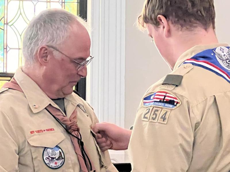 Eagle Scout Eric Richmond gave his Eagle Scout mentor pin to Troop 254 Scoutmaster Bruce Bossow for his help along Eric's Scouting journey. (Photo courtesy Chuck Mahaleris)
