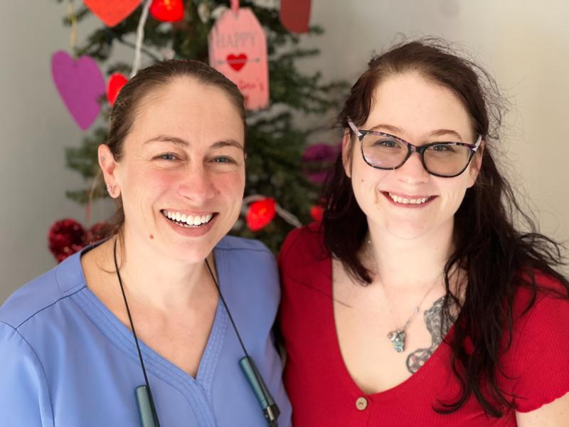 Dr. Shanna Gagnon of Gagnon Dental with Survivor Amanda Vogel, for whom she restored eight teeth, filled a cavity, and provided cleanings. “Everyone in the office," Vogel said, "from the receptionists to the hygienists to the doctor made me feel welcome and worthy. I have gone through things people could not imagine. I had a lot of self-hatred and now, because of Finding Our Smiles, I have self-love.” (Photo by Patrisha McLean)