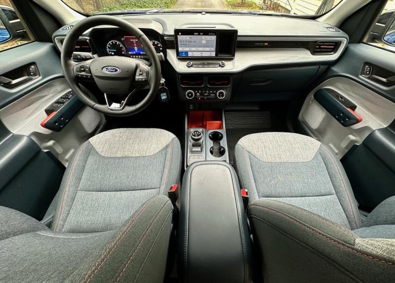 Right-sized, well-furnished and organized, the Maverick XLT cabin has everything a driver needs and nothing they do not. It is also surprisingly comfortable. note the rotary gear-selector dial and the electronic e-brake switch just below.