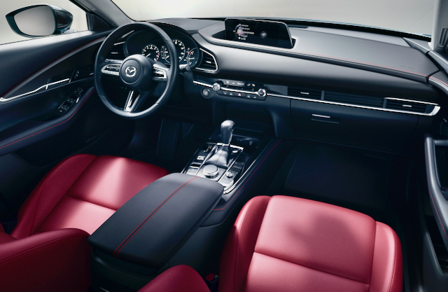 This is the available 10.25-inch touchscreen, one of the few changes from 2023 to ’24 in the CX-30, with wireless Apple CarPlay and Android Auto; it works with the turn & click knob on the center console. (Standard is an 8.8-inch screen; both interface with the MyMazda app.) Commonly used functions are controlled by actual switches, not sliders, and some are duplicated on the steering wheel. In Premium Plus trim, the CX-30 cabin approaches Audi/BMW levels of fit, finish and design.