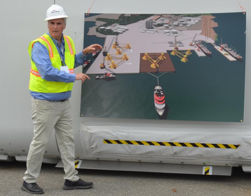 Sprague’s Vice President of Materials Handling James Therriault illustrates the Mack Point plan with a rendering of the site that would front Penobscot Bay. (Photo by Lynda Clancy)