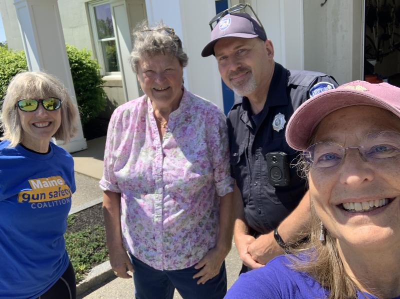 Taking the formality out of gun disposal. L-R: State Representative Vicki Doudera, D-Camden, and Senator Pinny Beebe-Center, D-Rockland, with Police Officer Troy Peasley and Maine Gun Safety Coalition volunteer Laura Edwards. (Photo courtesy Laura Edwards)