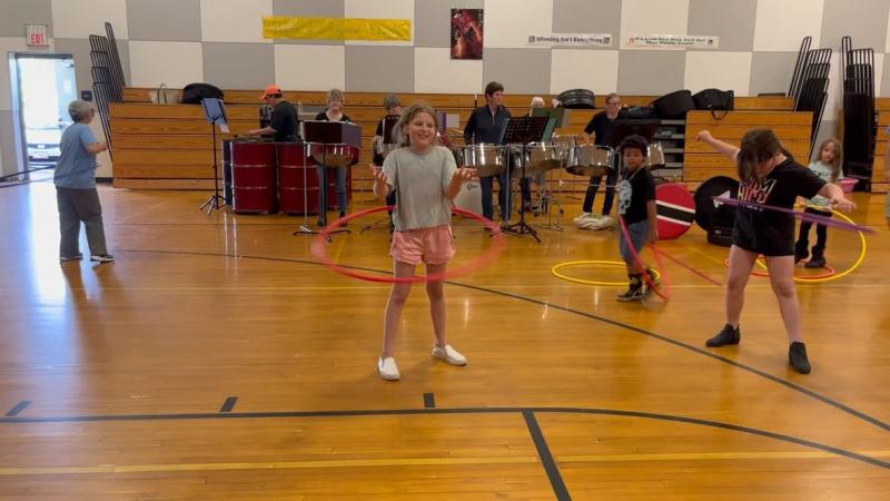 Hula hooping with the band. (Photo courtesy Brenda Thomas)