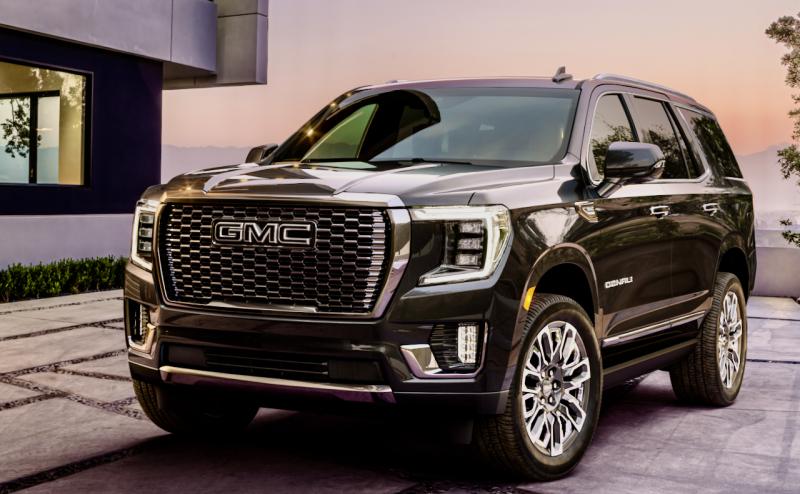 Imposing as the Yukon Denali is, thanks to a well-calibrated suspension and controls, plus a 360-degree protection zone of sensors, alerts and cameras, it drives much smaller than might be expected. This color is Titanium Rush Metallic.